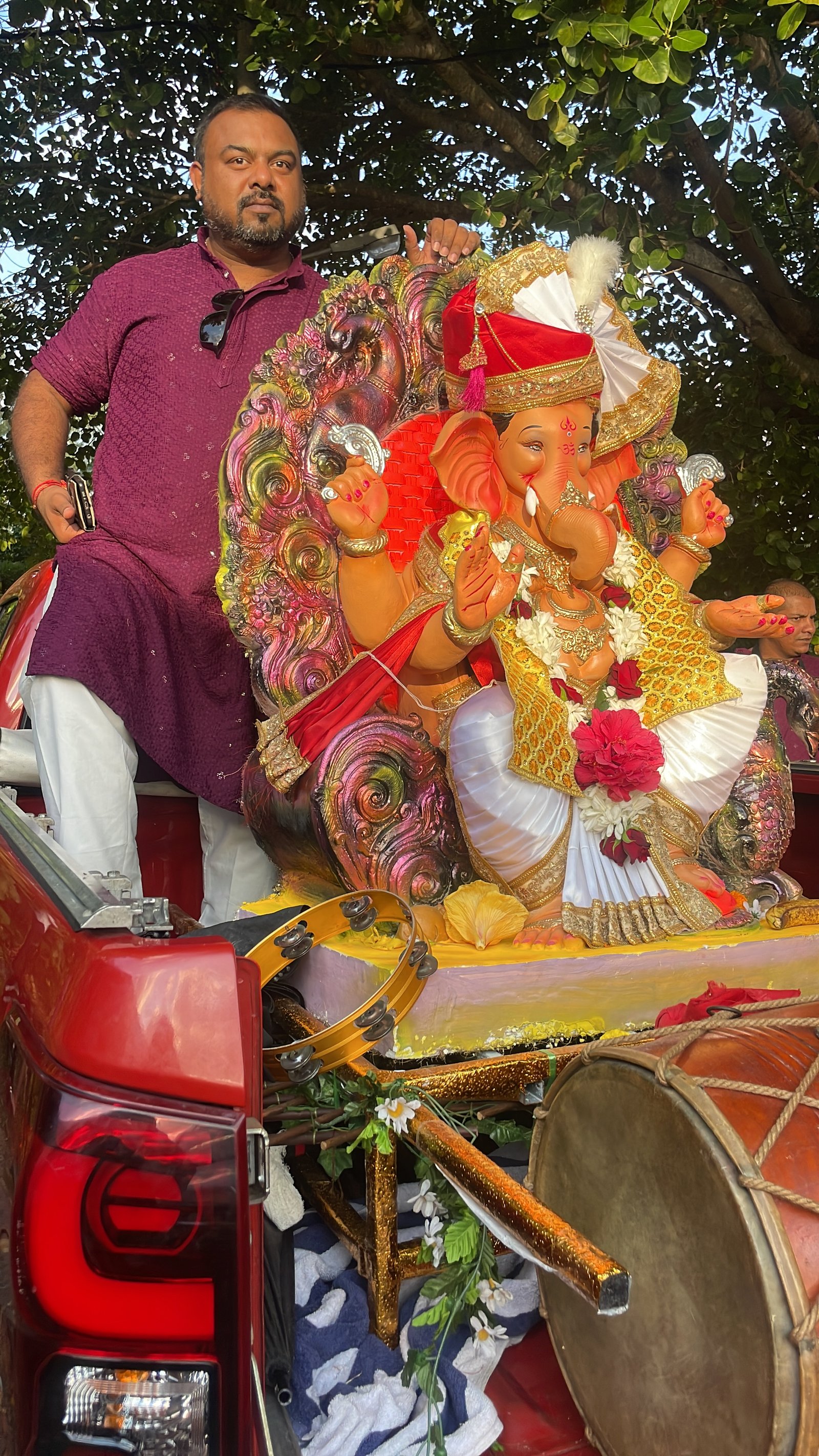 person-beside-decorated-ganesha-statue-01